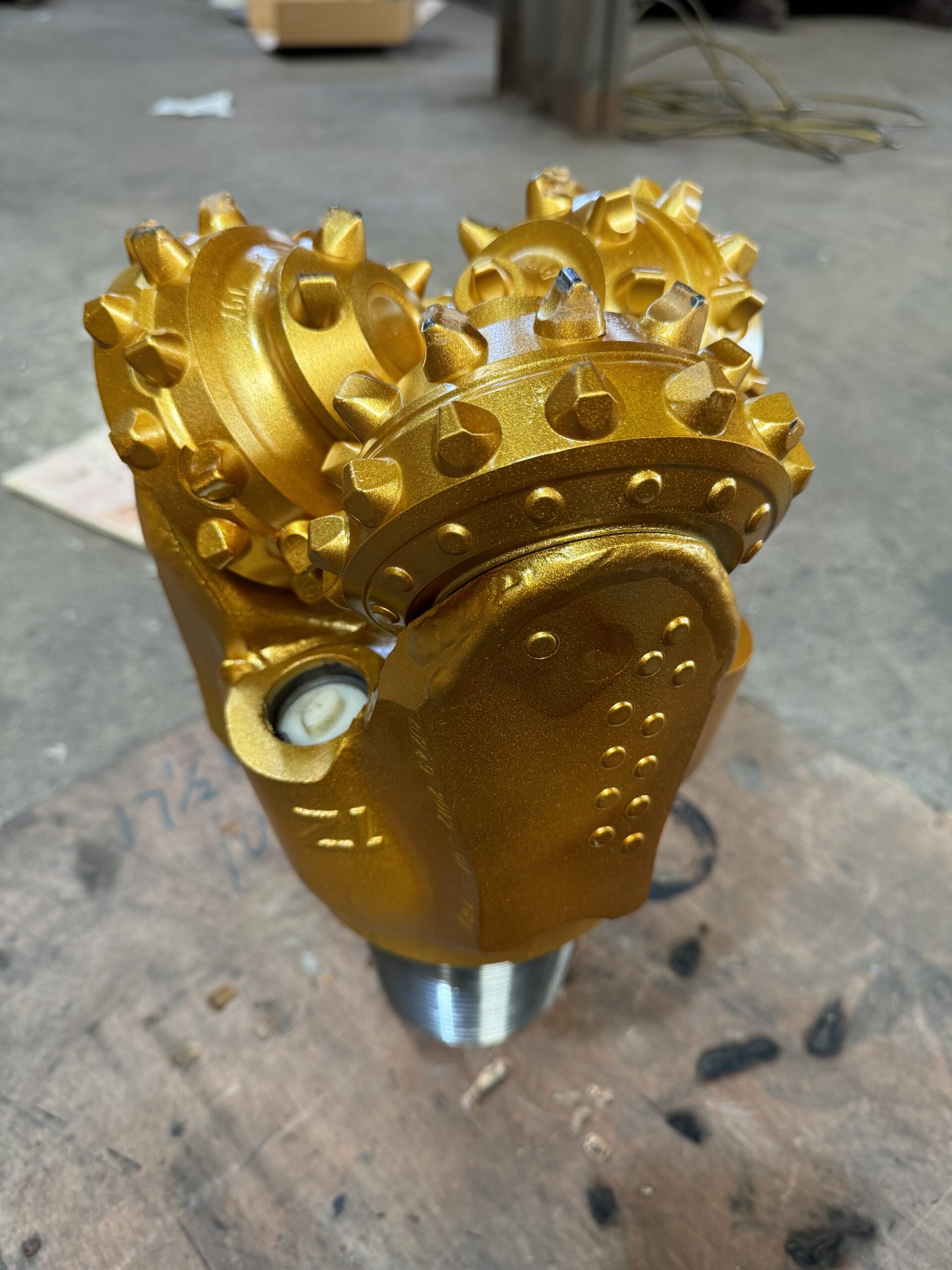 High Performance Tricone Bit Tooth Layout Design